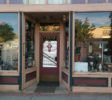 Baker City heritage buildings mirrored in storefront windows